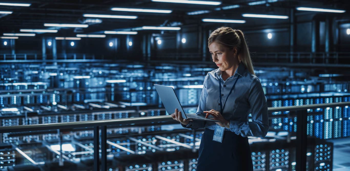 A woman is working on her laptop.