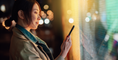 A woman is using her phone.